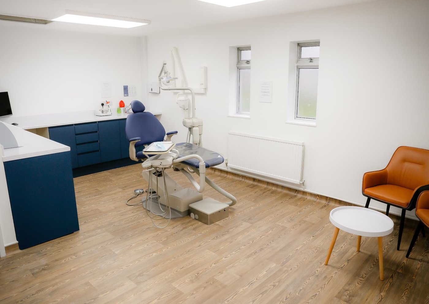 A modern dental surgery with blue accents at Astro Dental